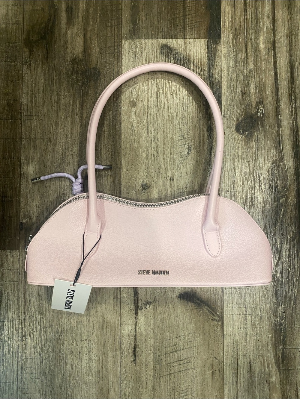 Steve Madden pink frost shoulder bag.